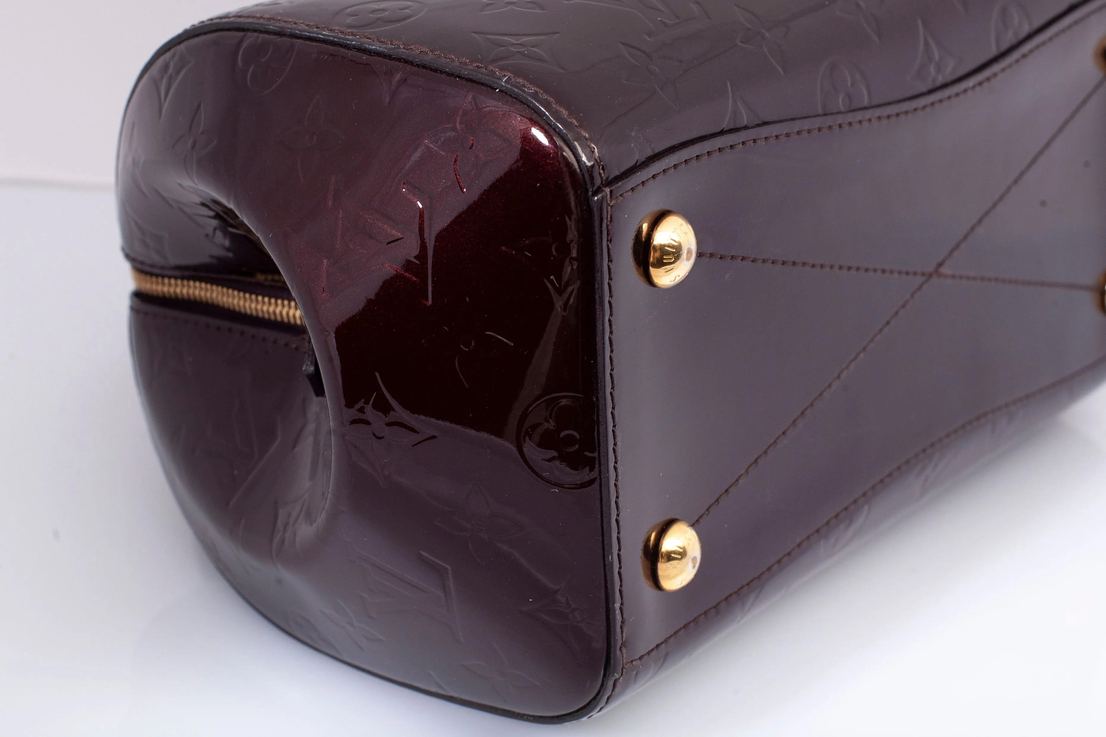 Authentic Louis Vuitton Amarante Monogram Vernis Montana Top Handle Bag
