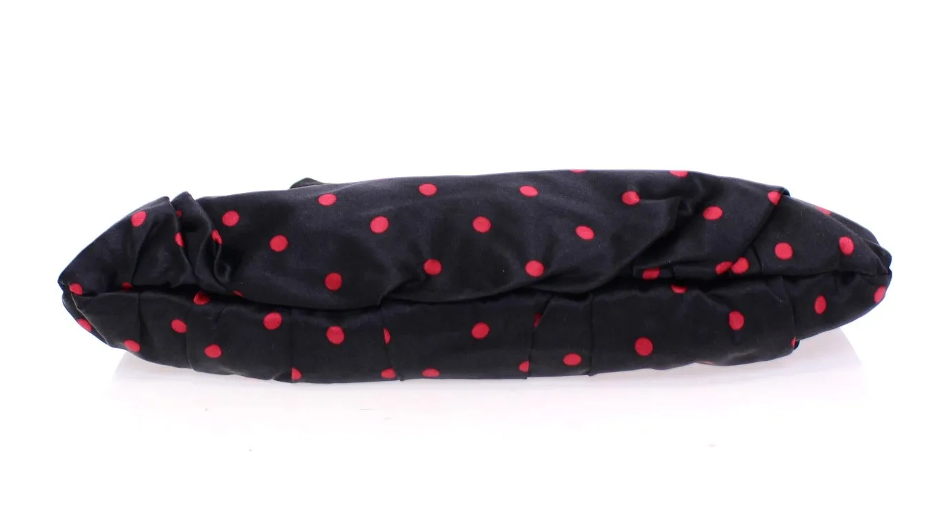 Black polka dotted silk clutch