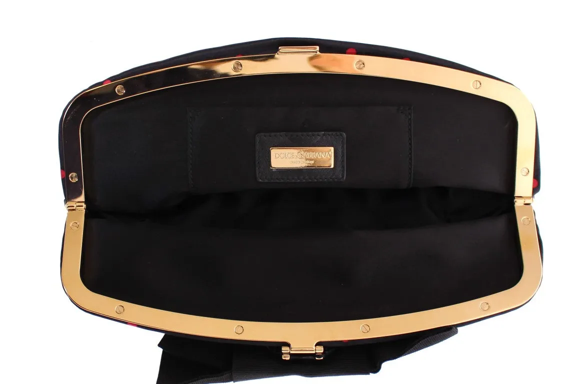 Black polka dotted silk clutch