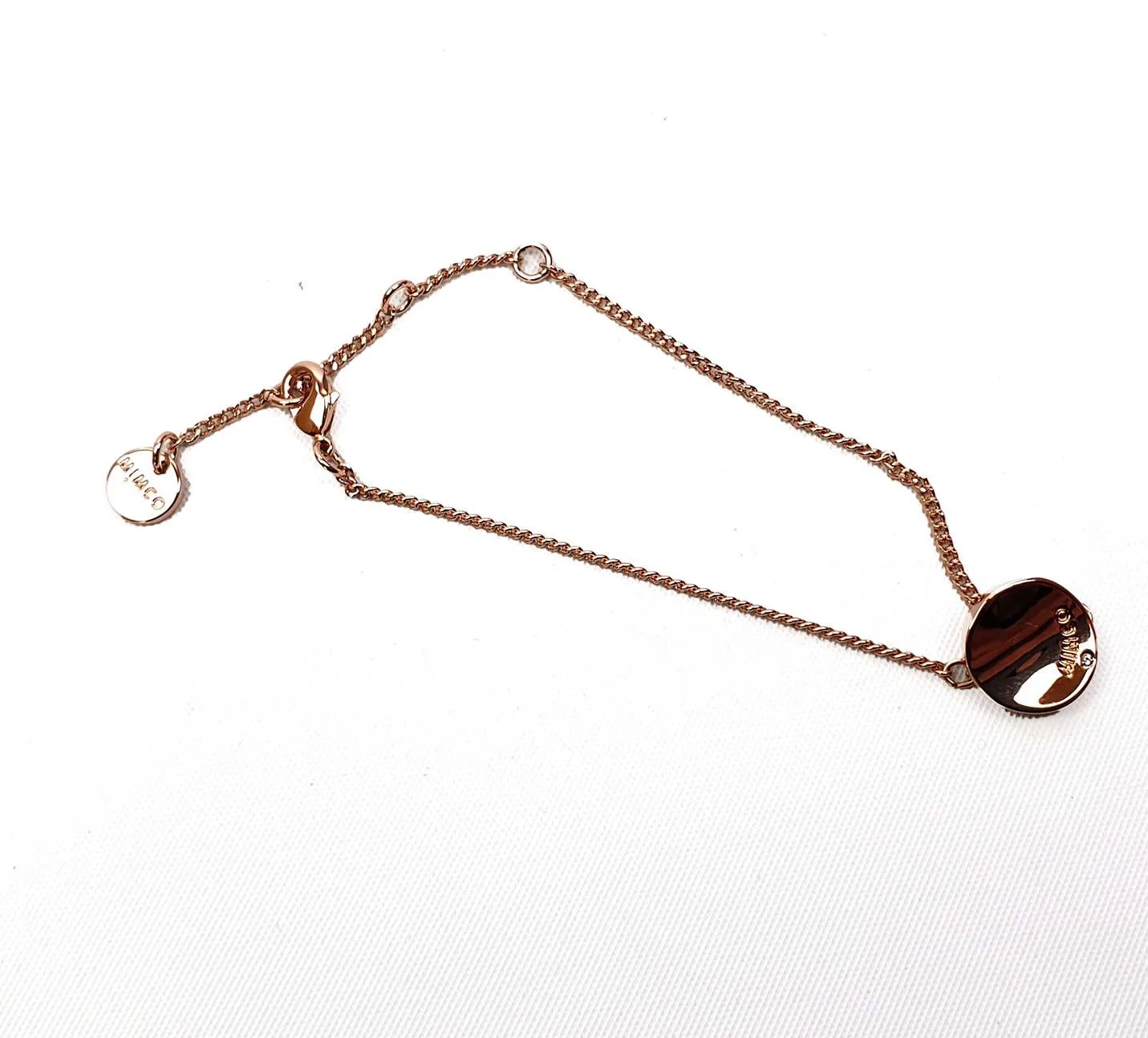 Mimco delicate bronze coloured  bracelet with diamante charm