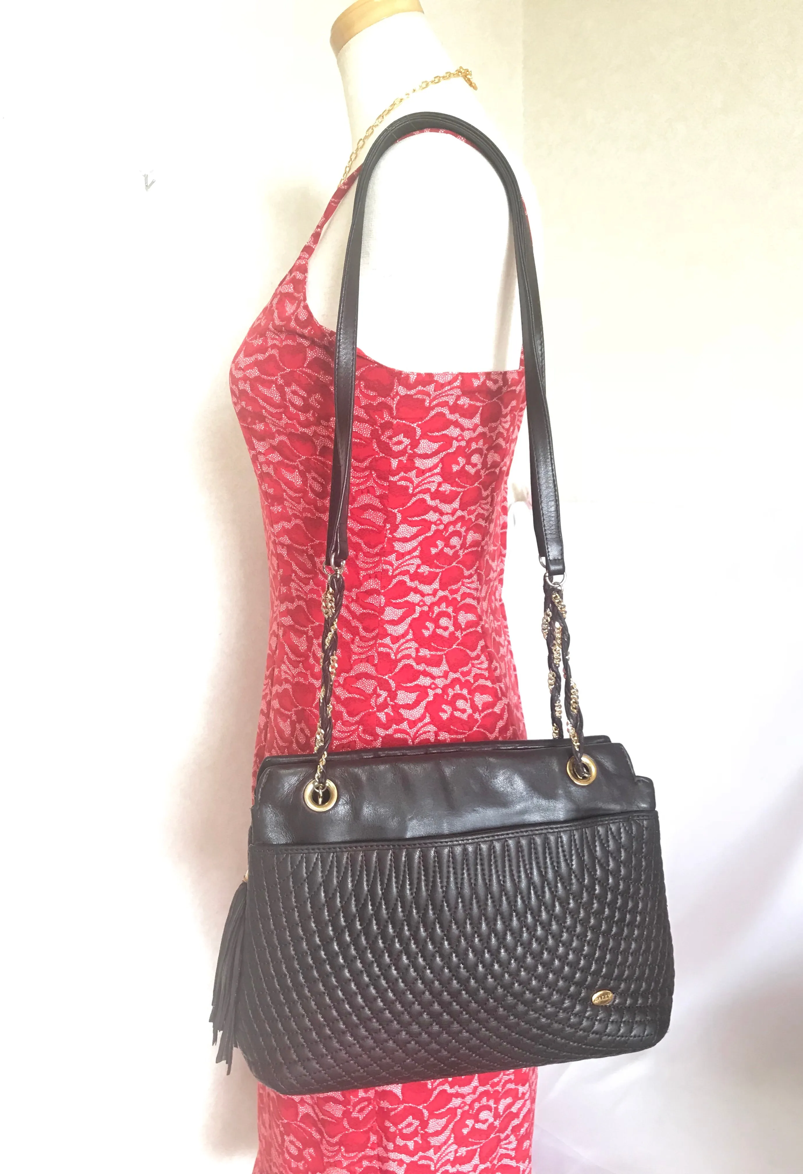 Vintage Bally quilted dark brown leather chain mix shoulder bag, tote bag with chain straps and a tassel to the zipper.