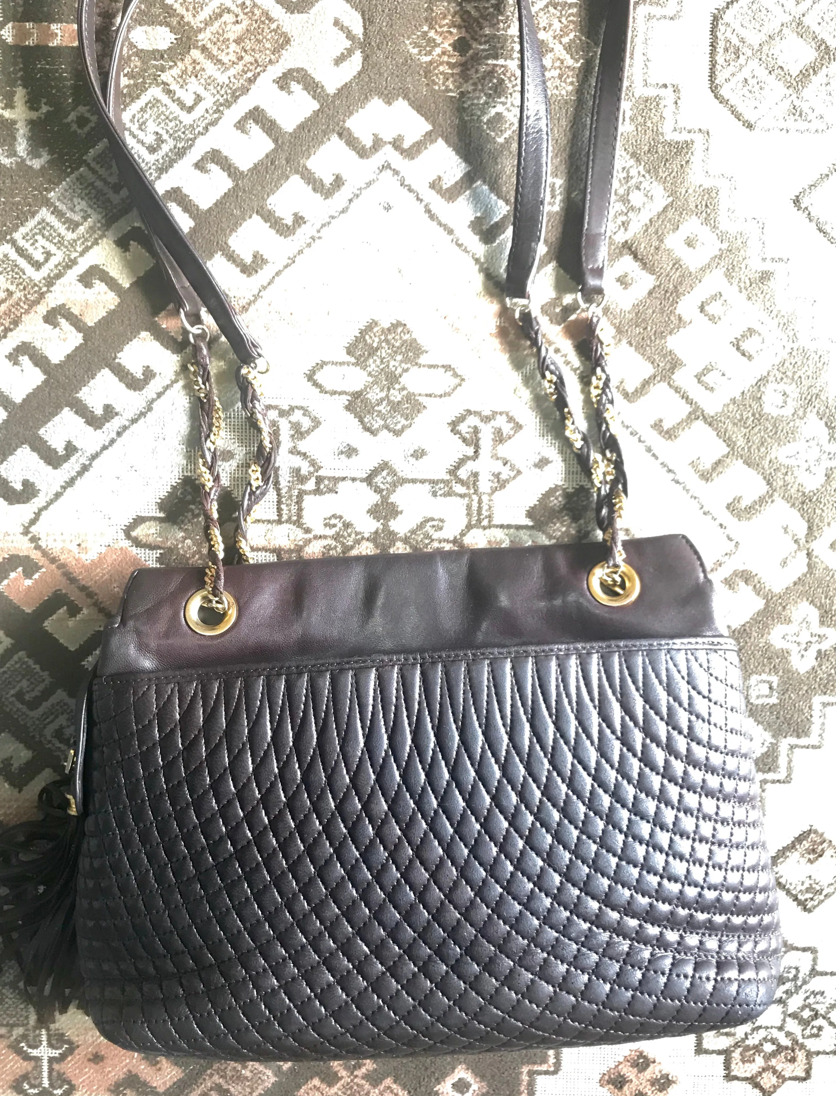 Vintage Bally quilted dark brown leather chain mix shoulder bag, tote bag with chain straps and a tassel to the zipper.