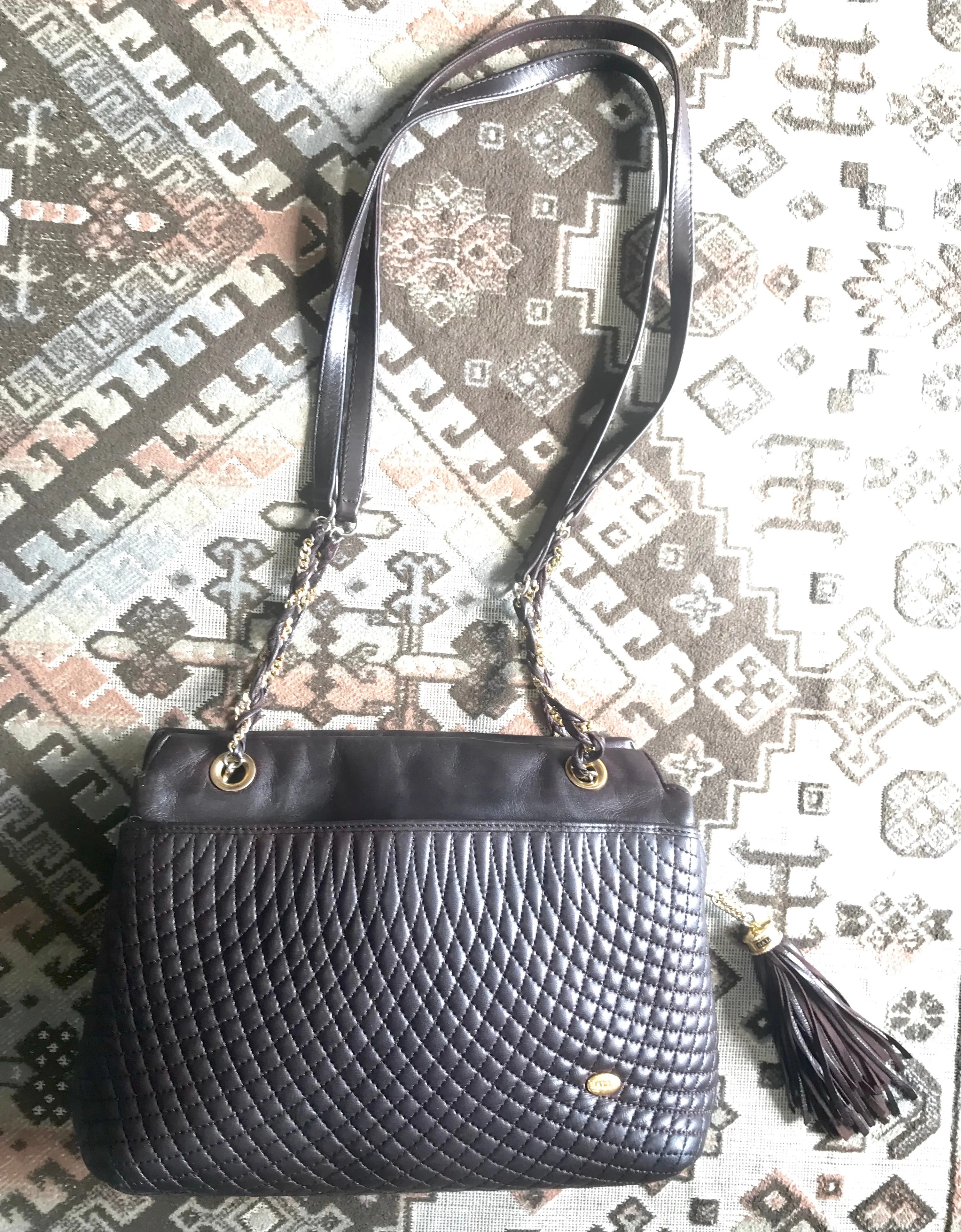 Vintage Bally quilted dark brown leather chain mix shoulder bag, tote bag with chain straps and a tassel to the zipper.