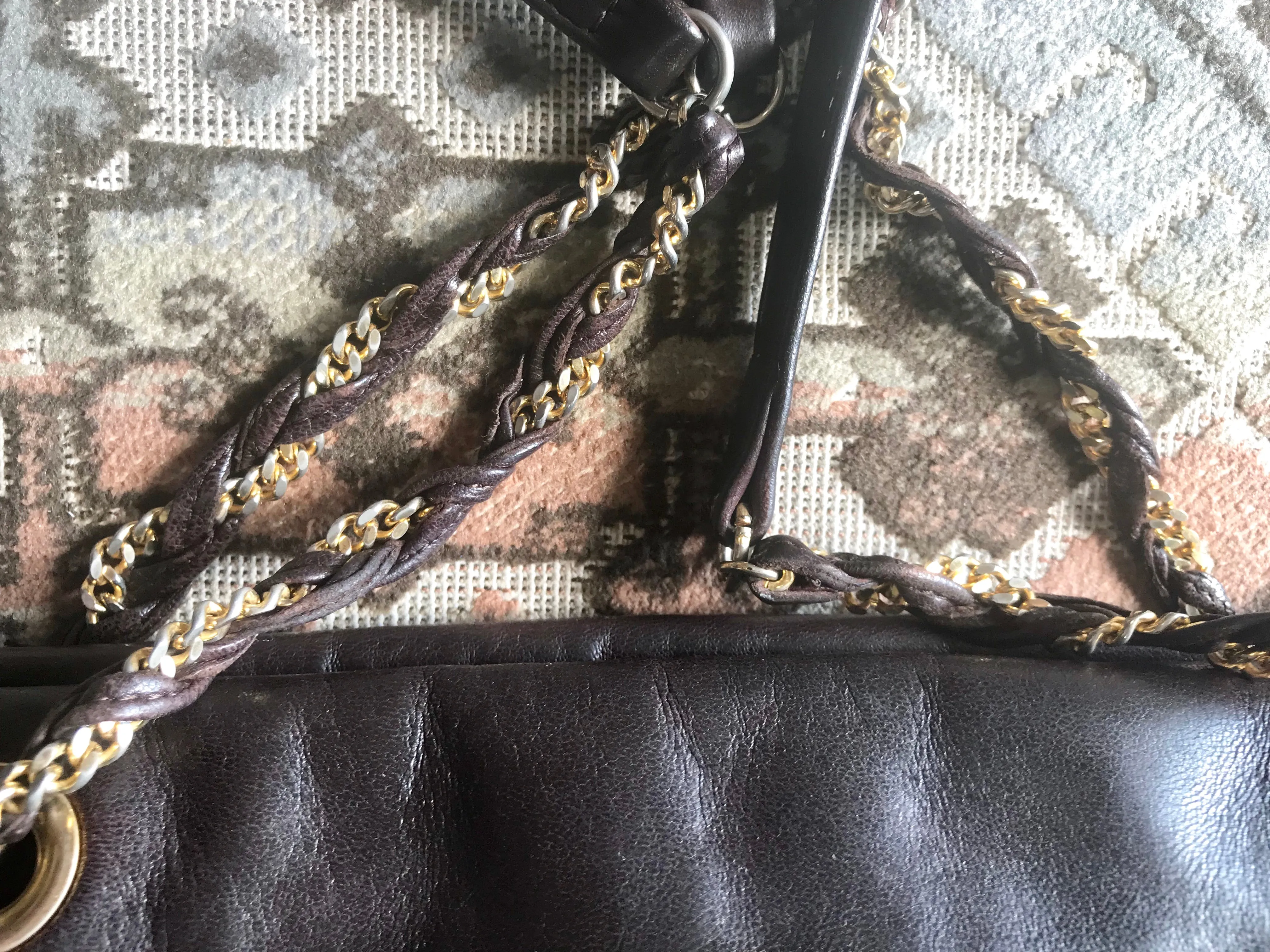 Vintage Bally quilted dark brown leather chain mix shoulder bag, tote bag with chain straps and a tassel to the zipper.