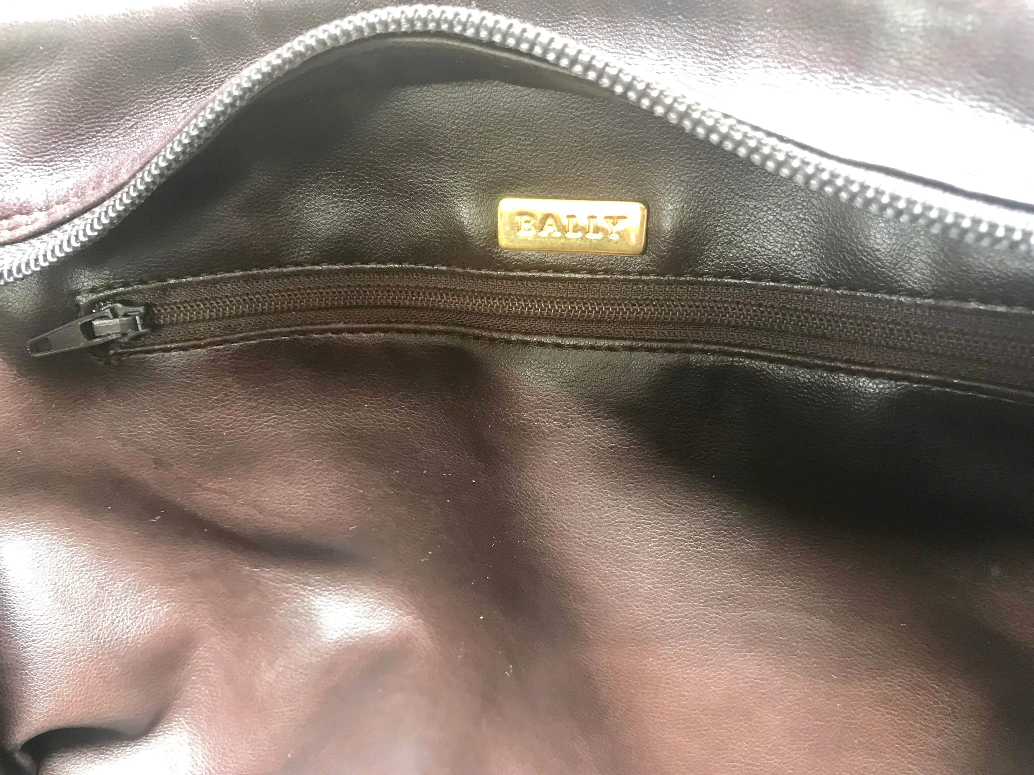 Vintage Bally quilted dark brown leather chain mix shoulder bag, tote bag with chain straps and a tassel to the zipper.